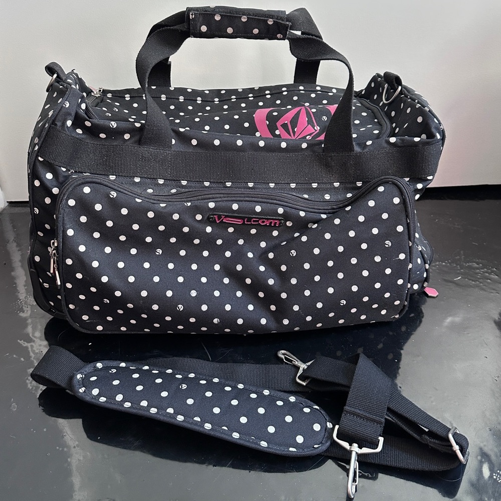 Volcom polka dot roller duffle